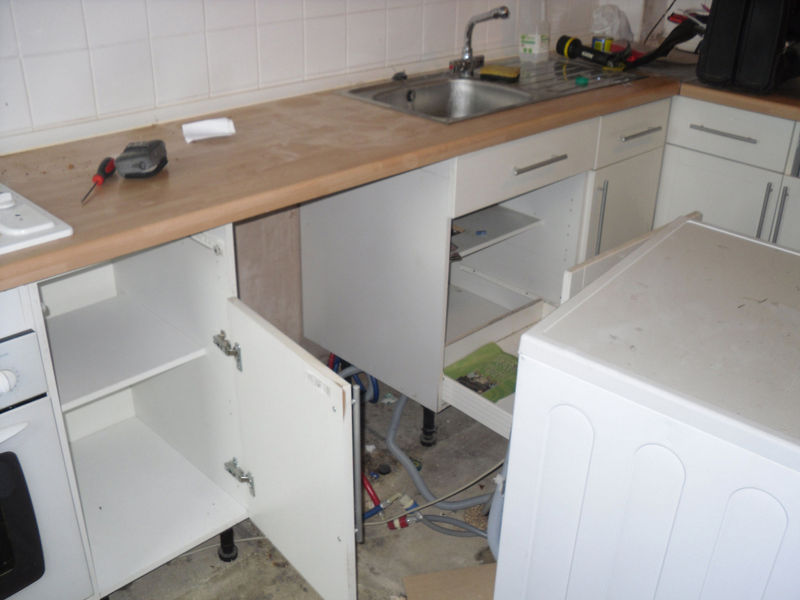 kitchen cabinets are completely demolished in preparation for the remodel