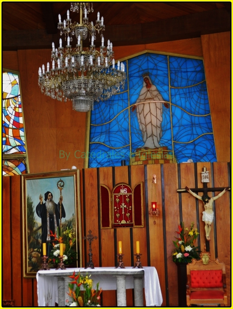 some religious items on a wooden wall