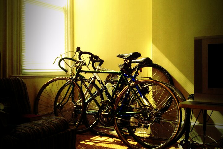 three bikes are sitting next to each other