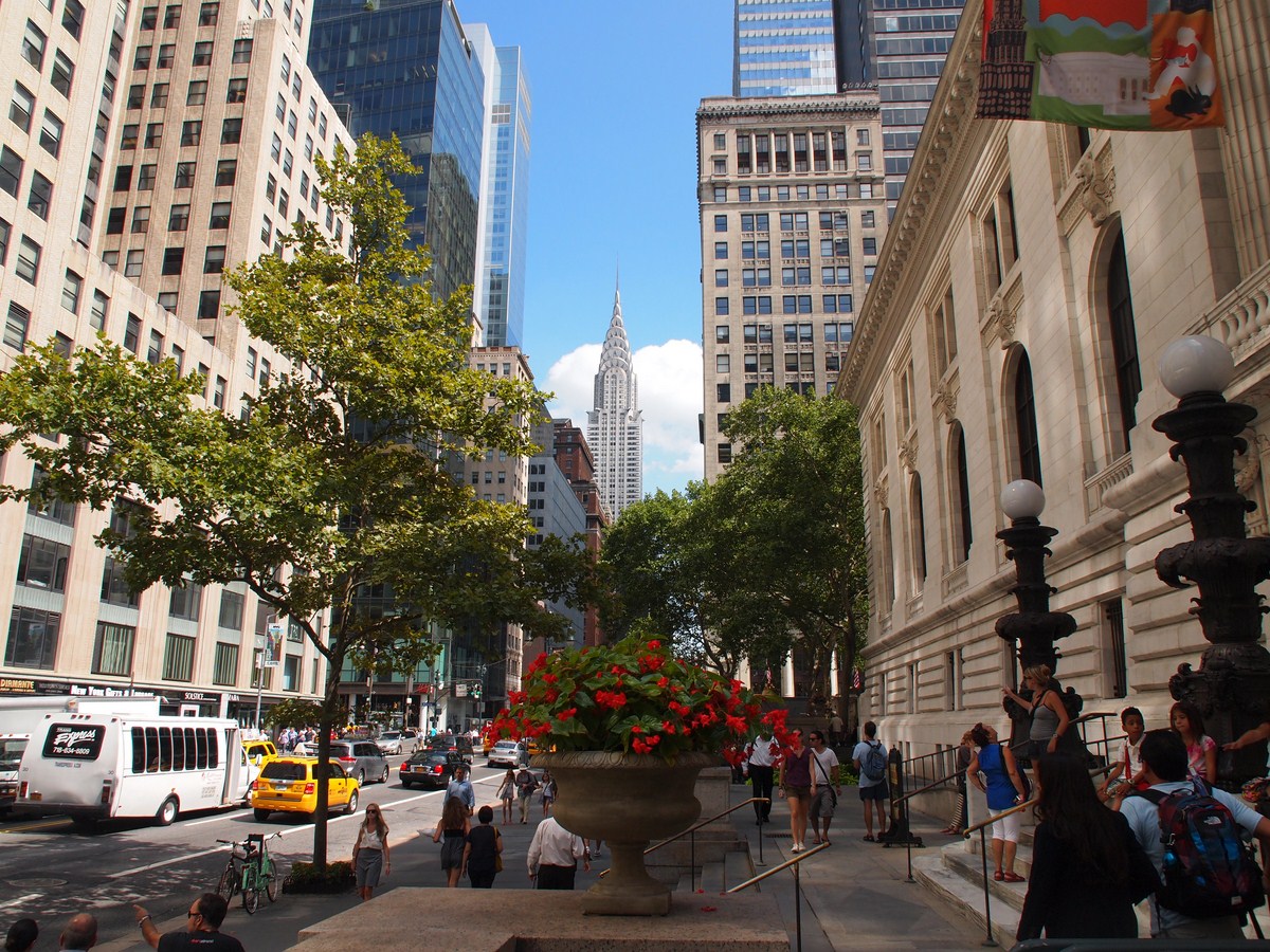 a view down a city street lined with tall buildings