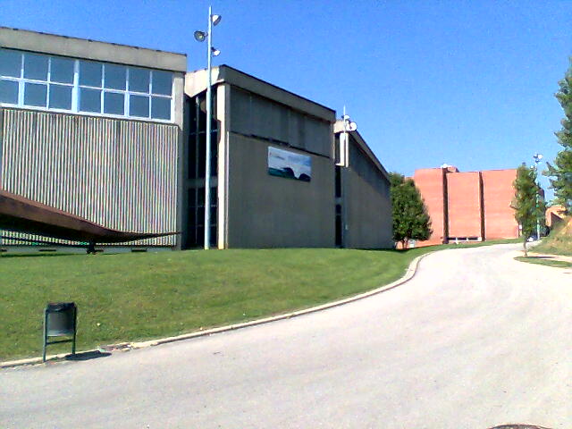 the view of an open drive way at the building