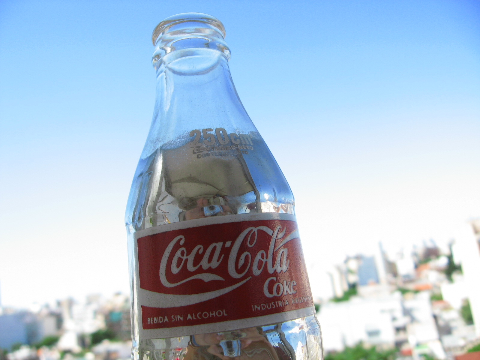 a close up image of a bottle of soda