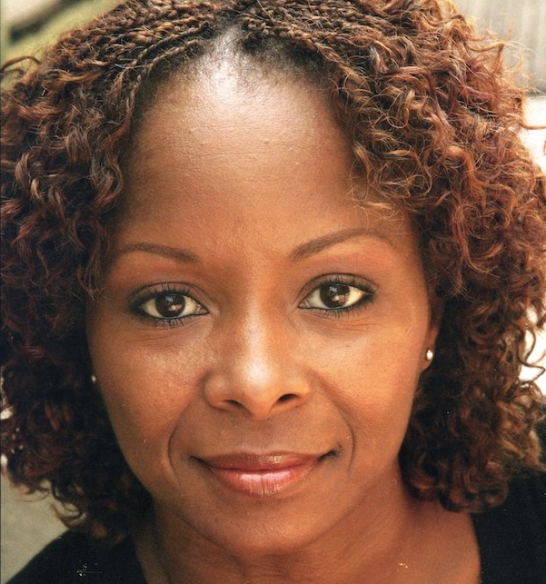 a close up of a person with wavy hair