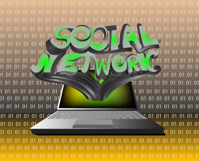 laptop with a social network coming out from the screen