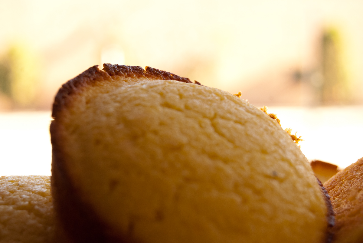 some kind of bread sitting up close together