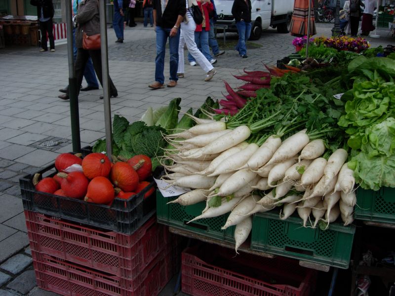 vegetables for sale on the side walk outside