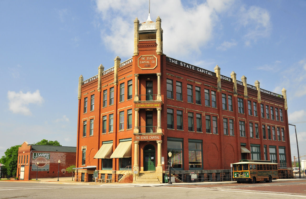 a building on the corner of a street