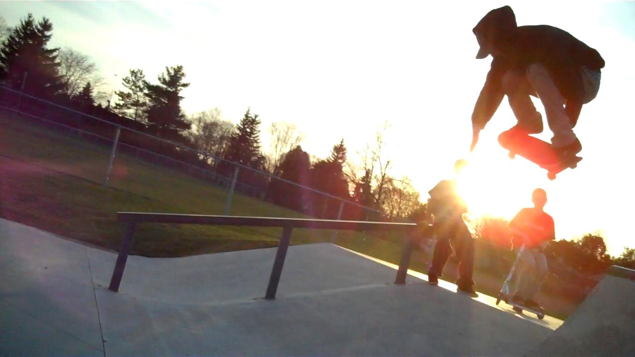 a man in the air while riding a skateboard