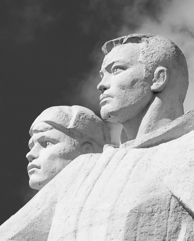 some statues that look like the presidents in the past