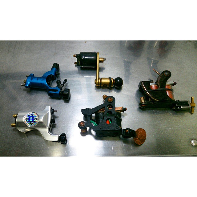several different kinds of motor parts laying on the ground