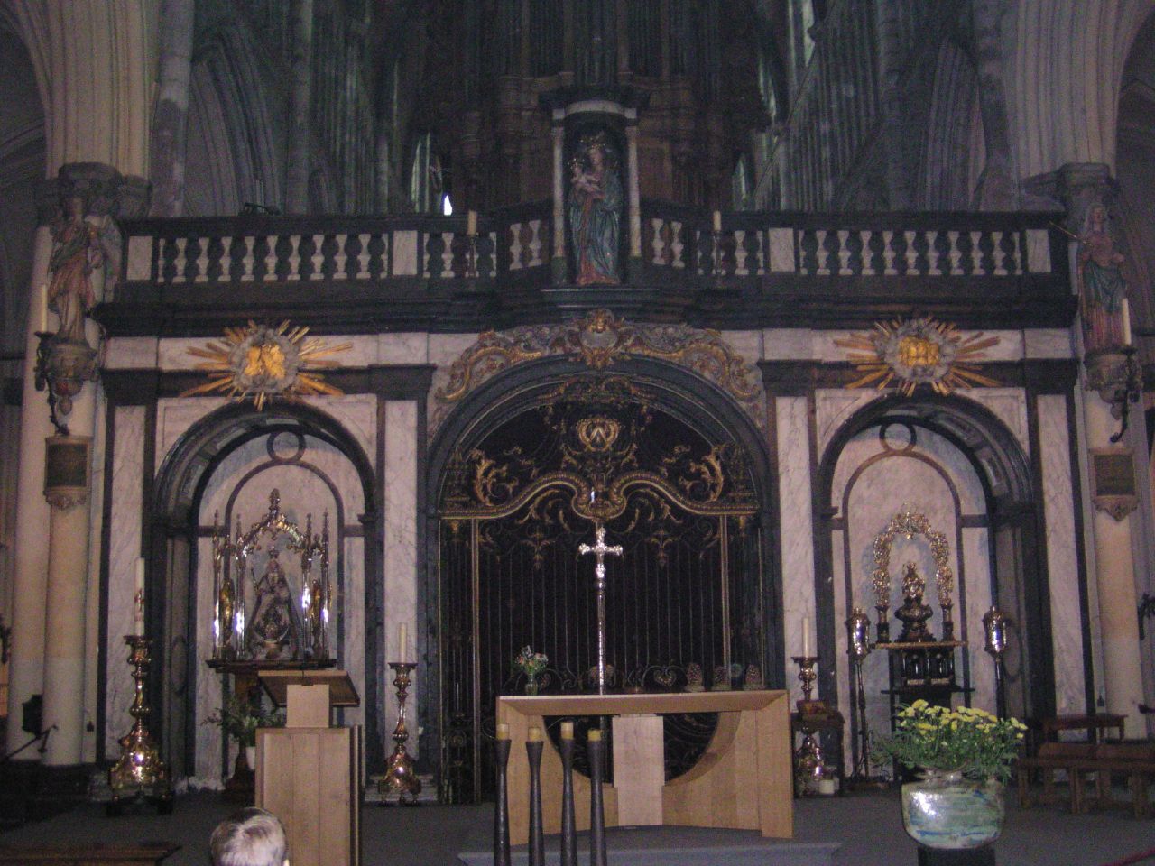 the altar inside the church is decorated with flowers