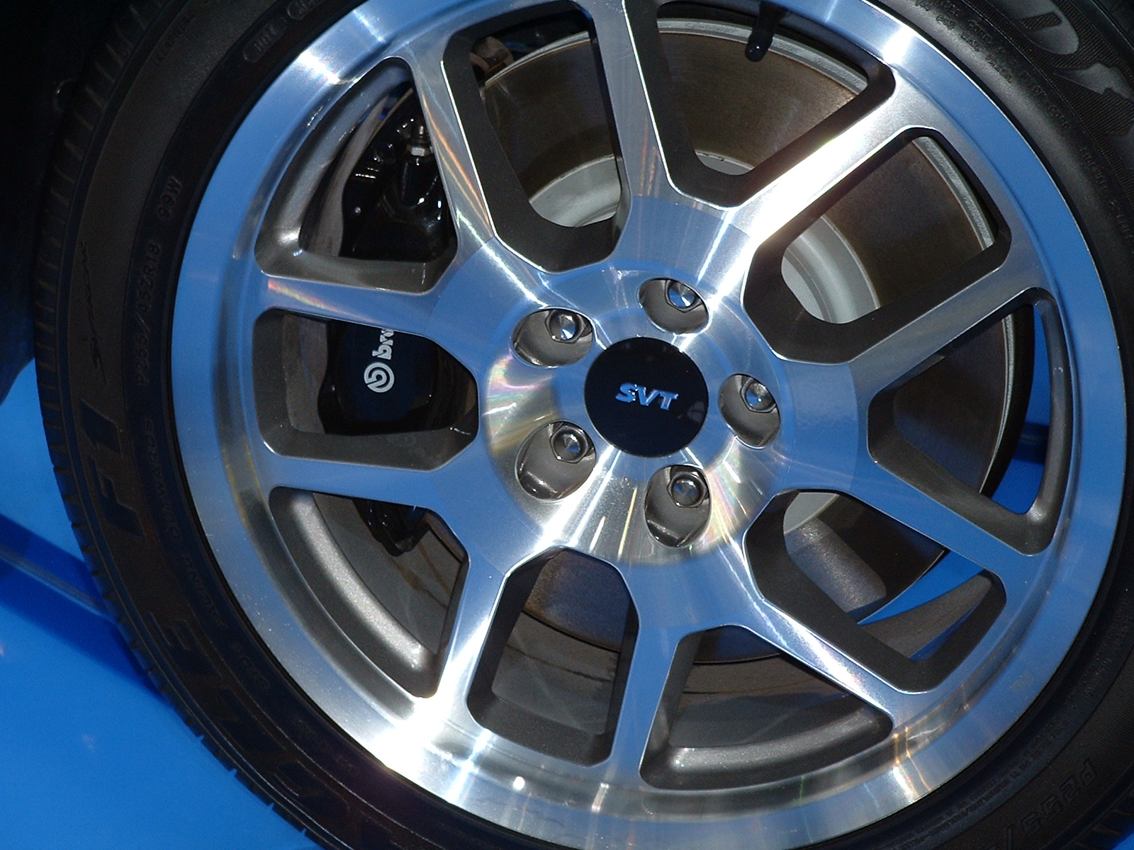 the rims of a vehicle on the blue background