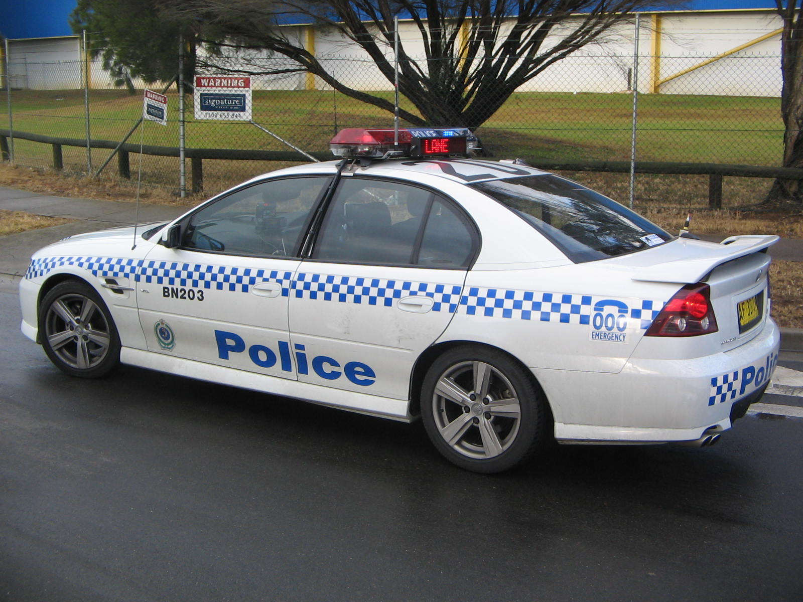 a police car that is parked in the street