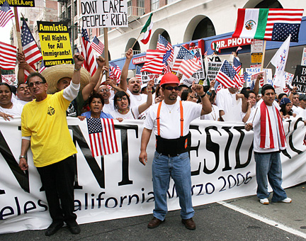 a group of men standing in the street next to each other holding flags
