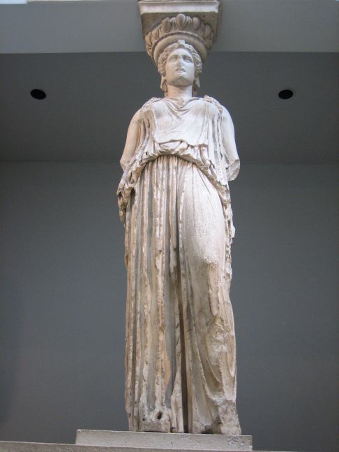 an image of statue of a woman wearing roman clothes