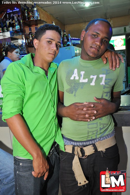 two young men are posing for a po