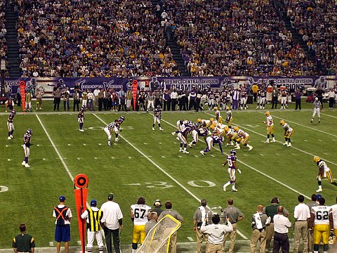 a football game with the players in the field