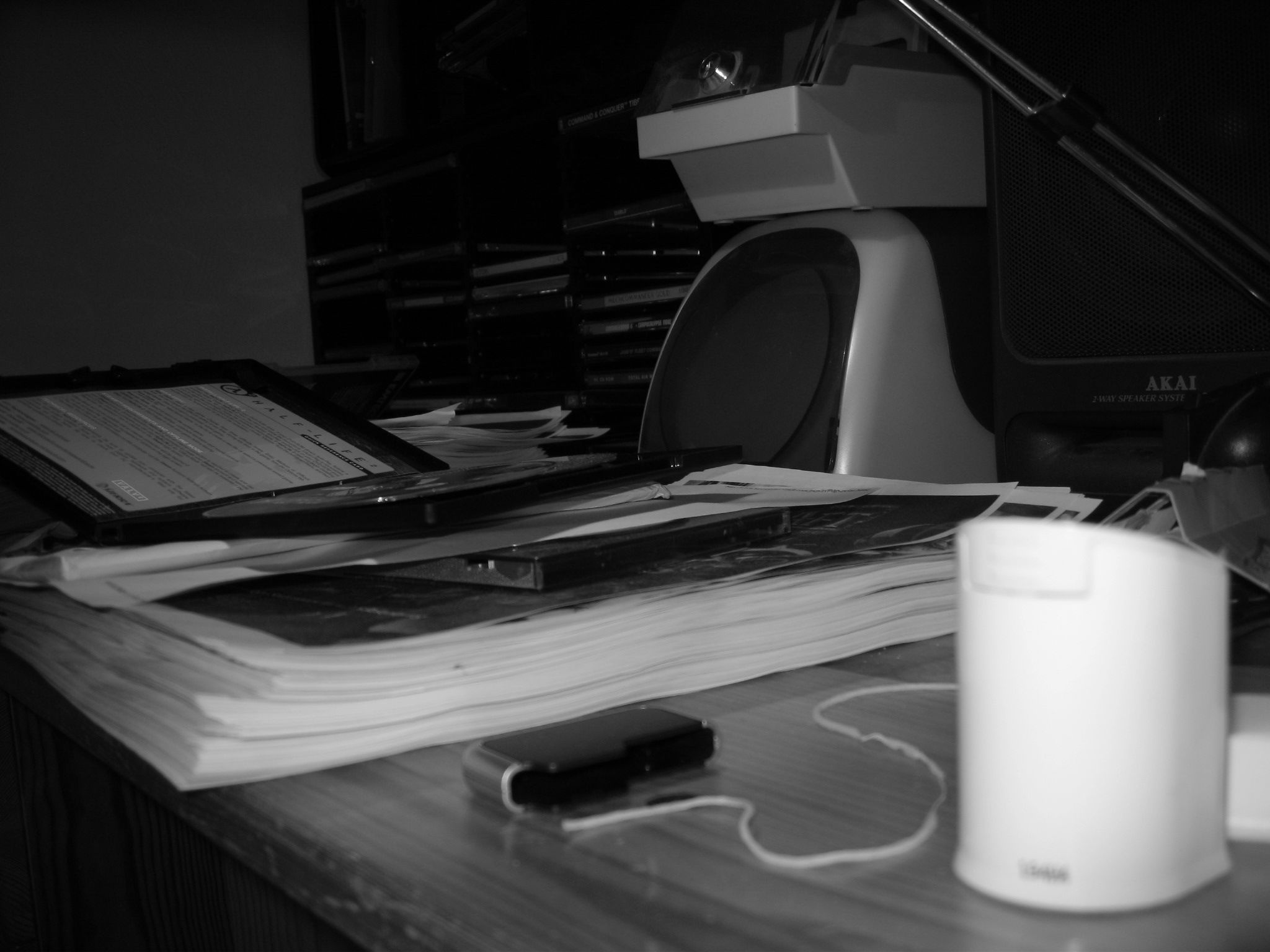 a black and white po of a desk in a home