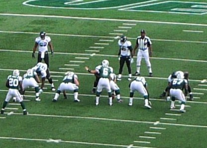 a football team in uniforms on the field