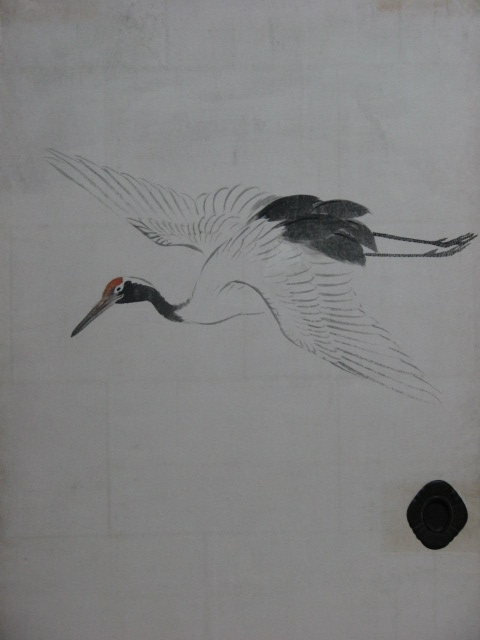 the crane is flying in the sky with its long beak extended