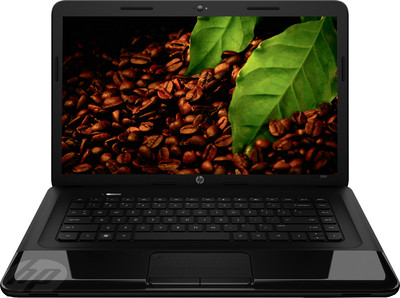 the back of a laptop that is filled with coffee beans