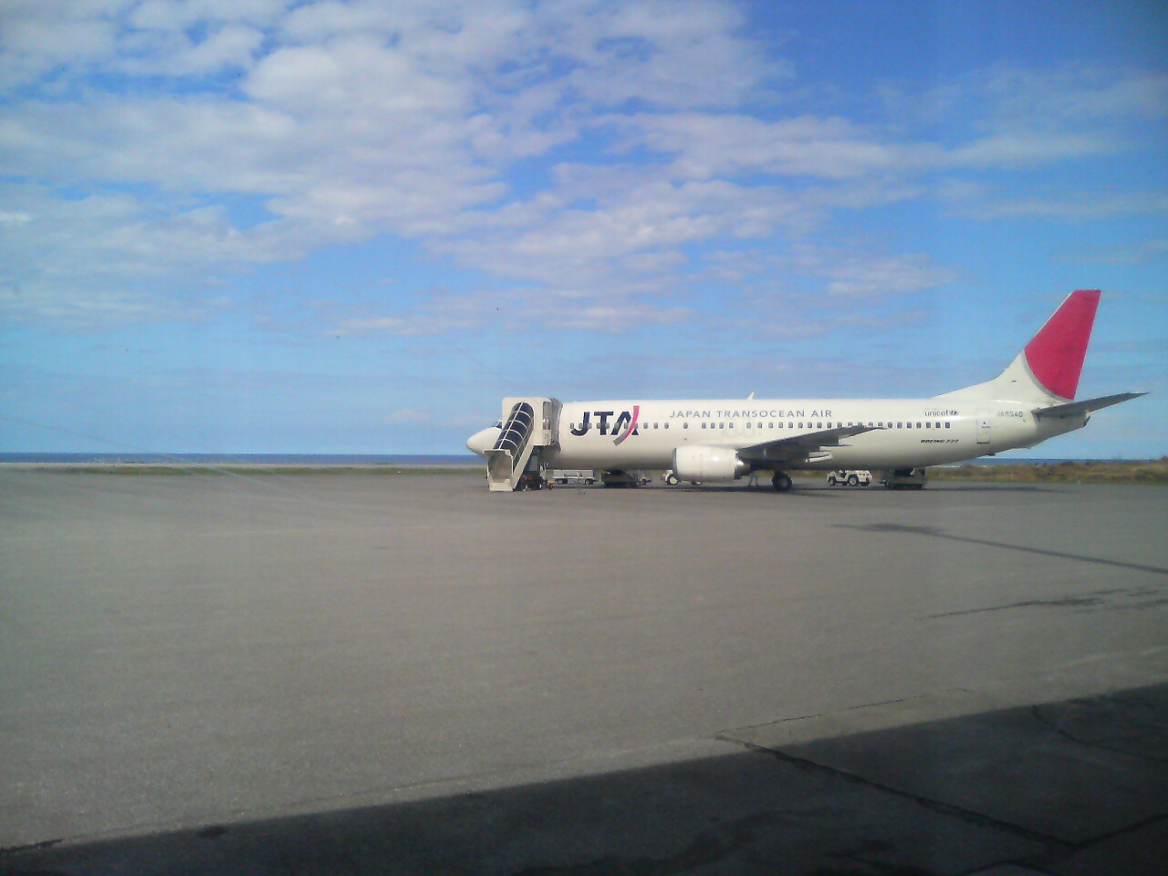 a large air plane parked on the tarmac