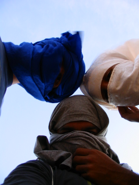 a close up of two people with one touching the other