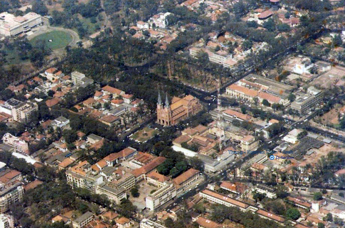 an aerial view of a city with many buildings