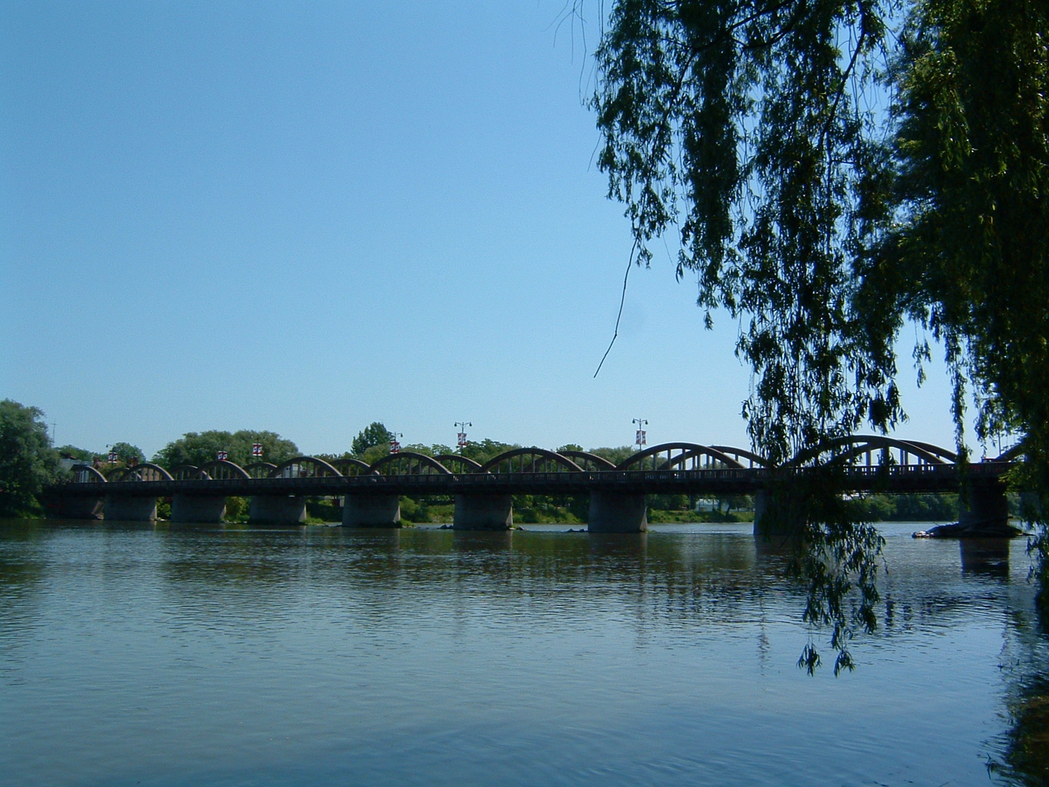 a bridge over water that leads to the other side