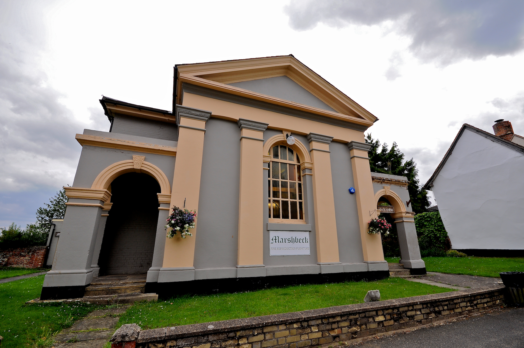 a building is displayed on the side of a street