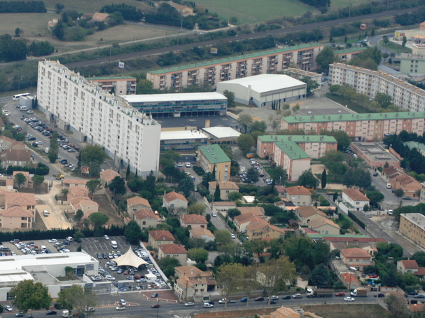 an aerial view of a small city with buildings