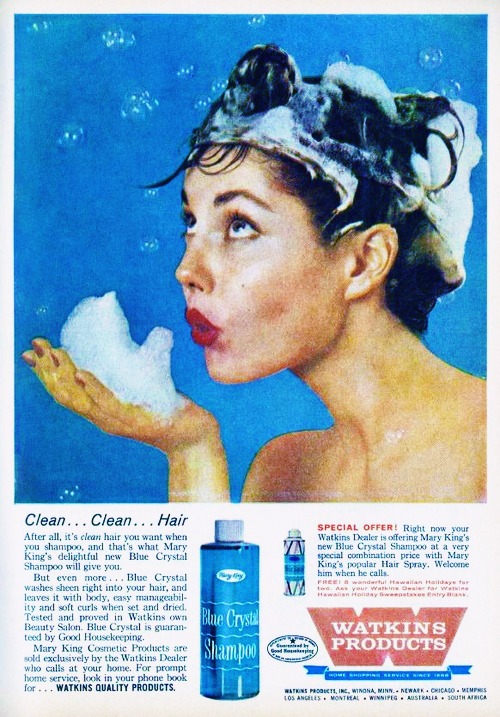 an old advertit shows a woman with soap and water bottles