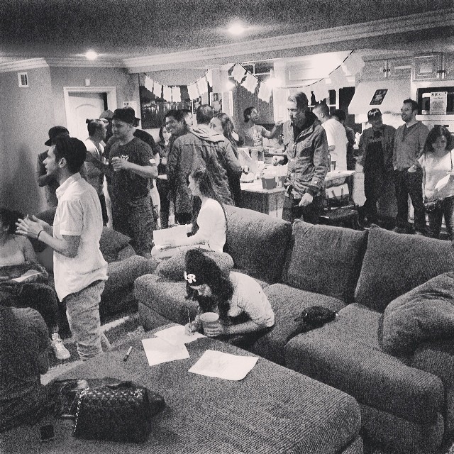 people gathered in a living room to socialize