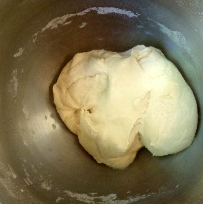 a doughnut in a bowl that has just been made