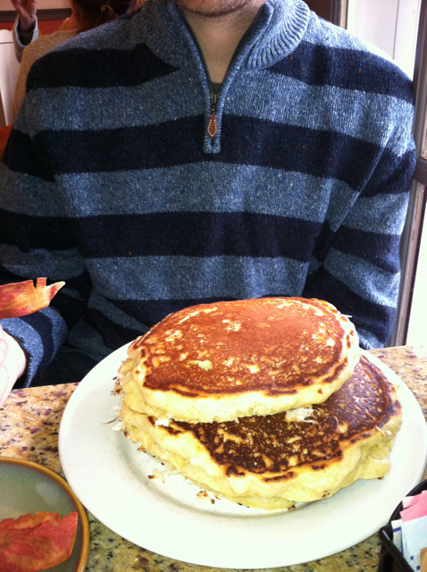 there is a large stack of pancakes on the plate