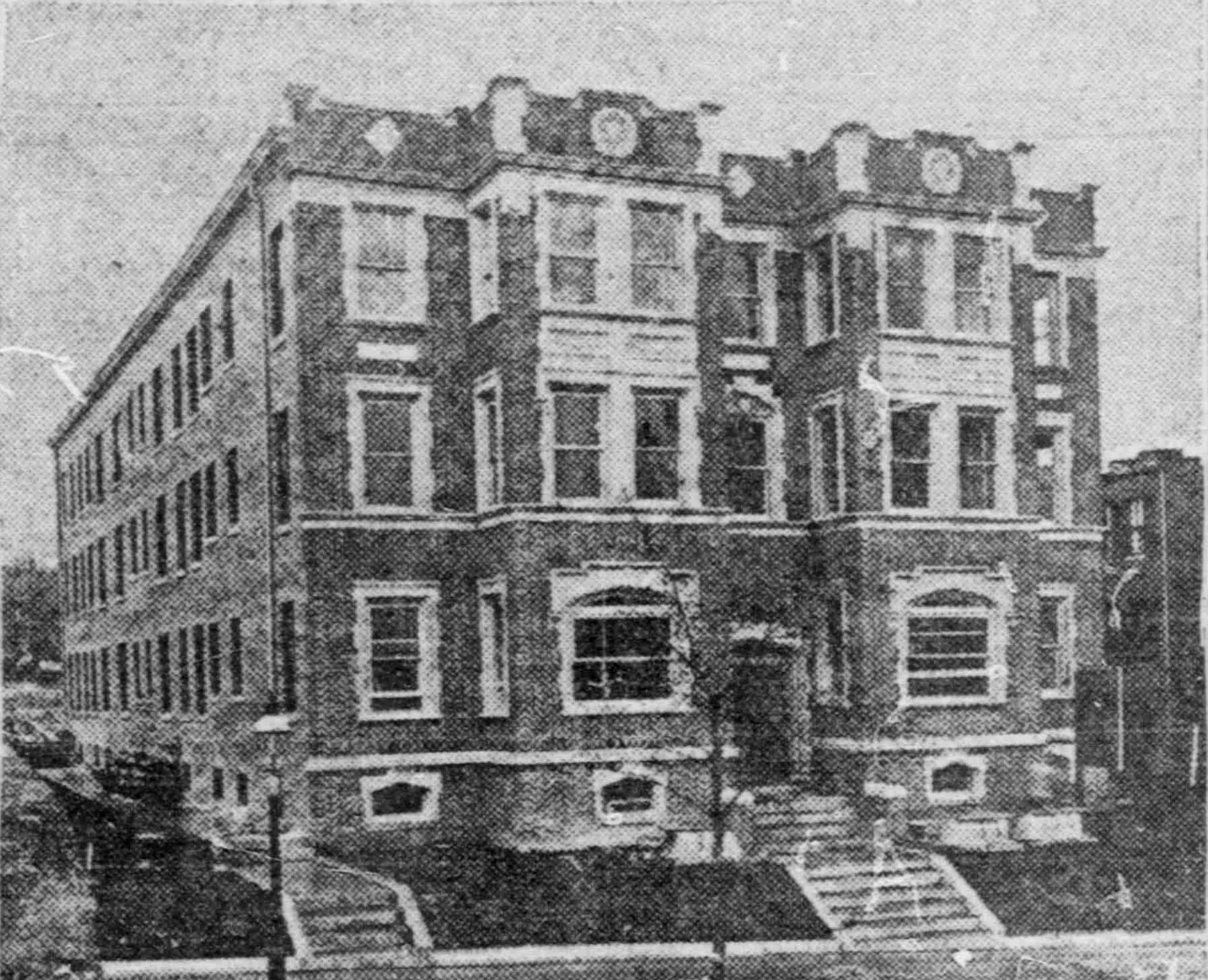 an old image of a very old building with the clock tower on top