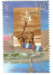 a stamp with a picture of a man holding a flag
