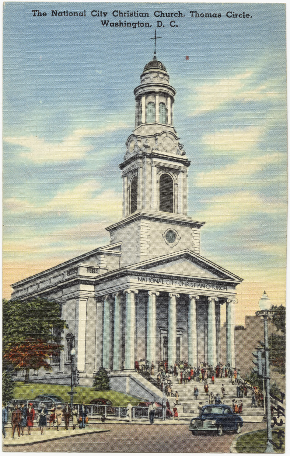 a church with a very tall steeple is pictured