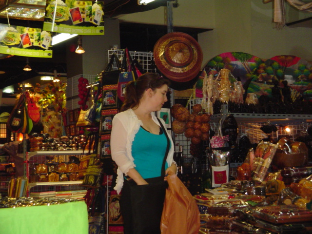 a woman holding onto her hand looking at items
