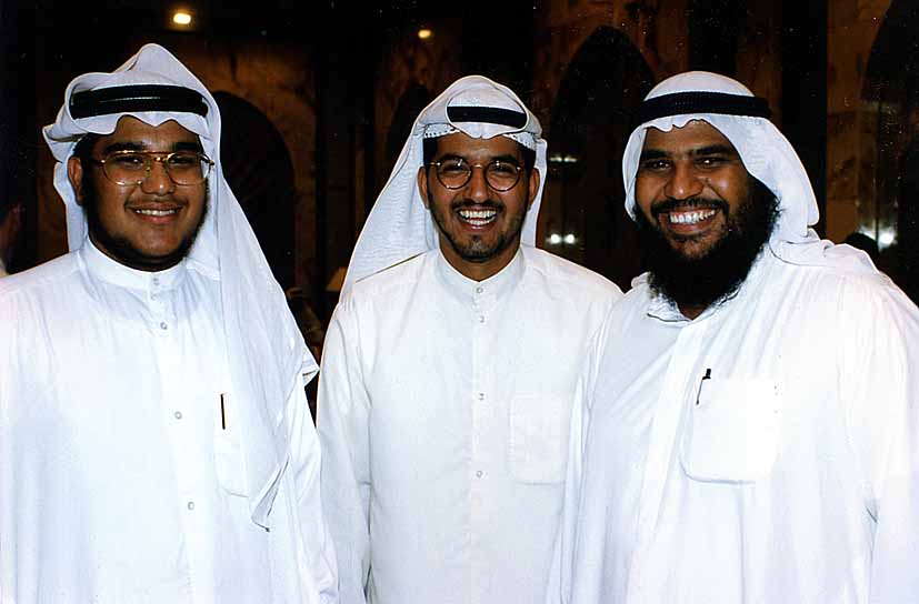 three arab men are posing for a po