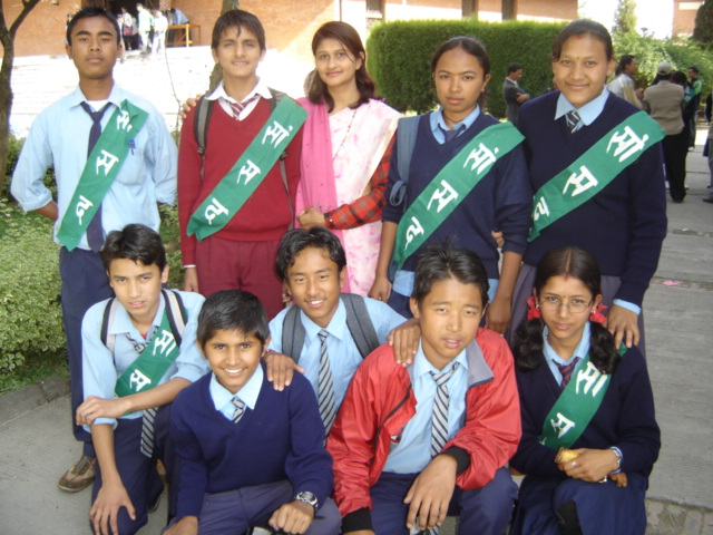 group po of students in their uniforms with ribbons