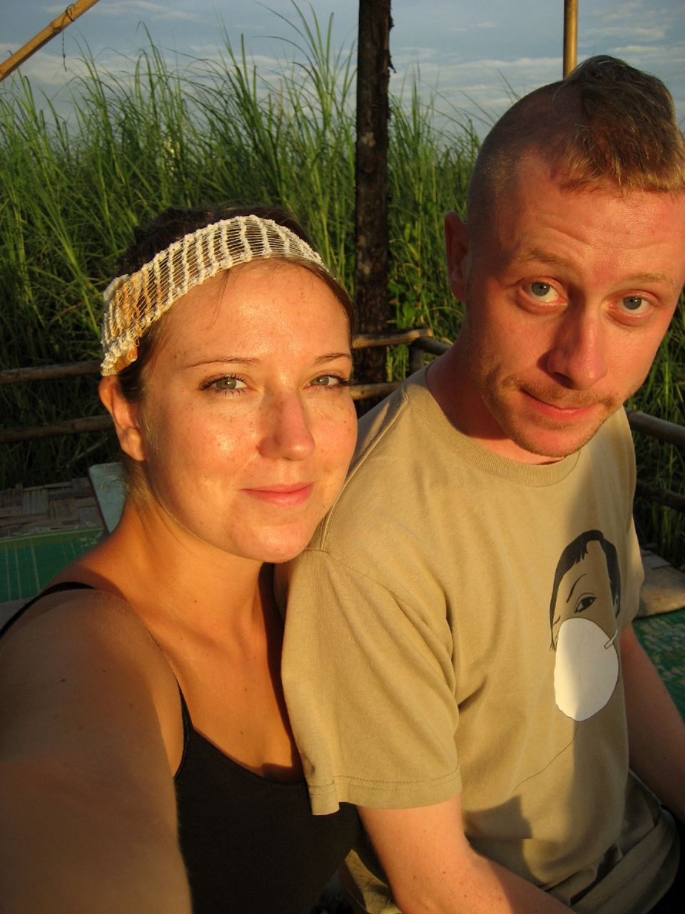 two people are sitting in the water together