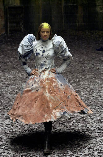 a woman in costume with some kind of head piece