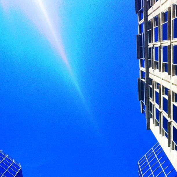 a po of buildings that looks upward in the sky