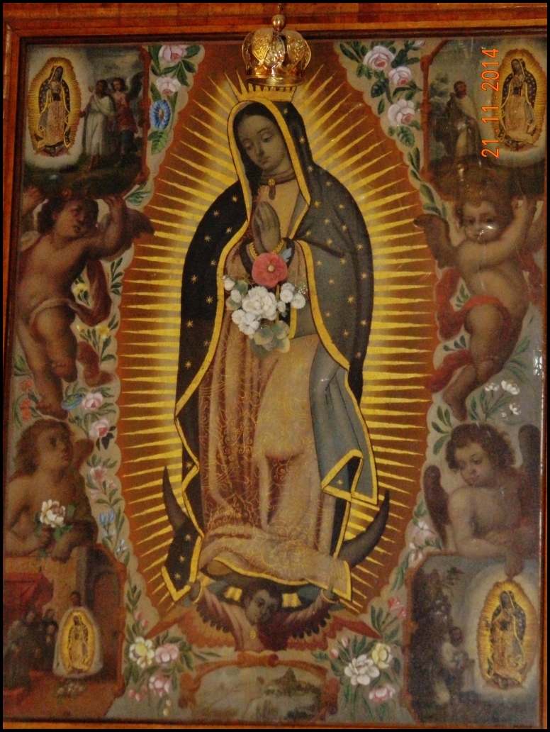 an image of the virgin mary with many angels