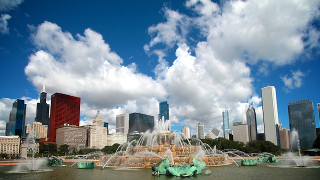 two fire hydrants sitting in the middle of the water