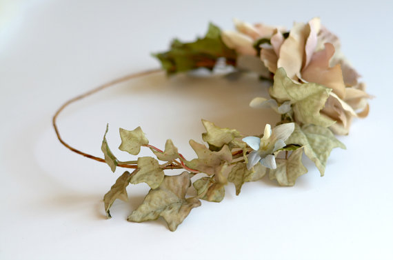 a bunch of fake leaves on a white surface