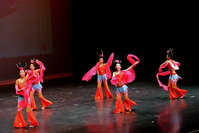 the dancers are performing oriental style in the act