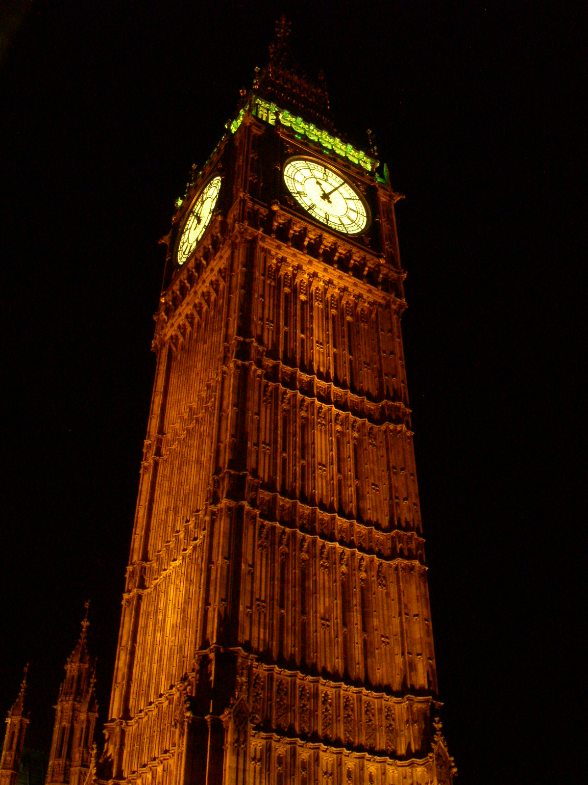 big ben illuminated up in the night sky