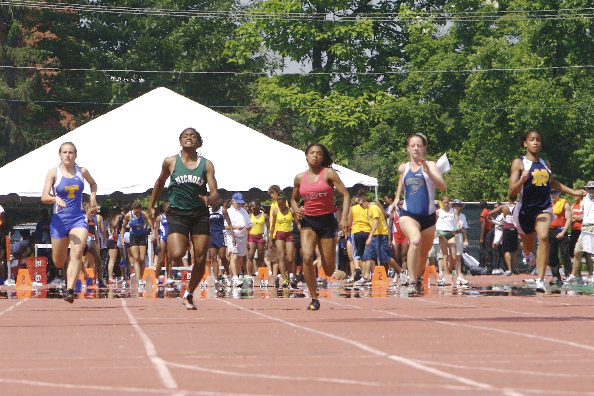 women race the starting line at a competition